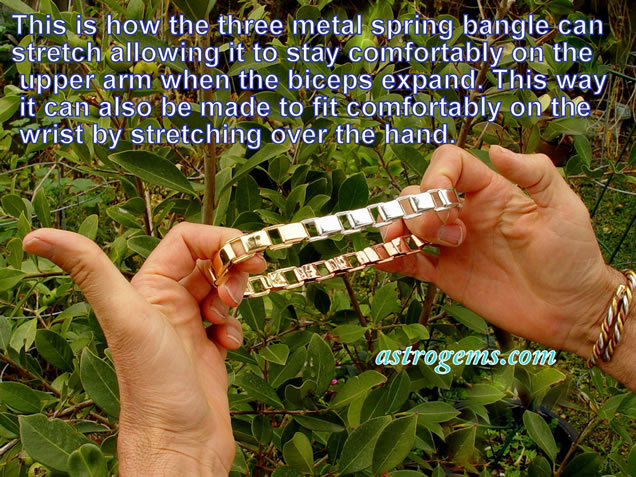 three metal spring bangle expanded
