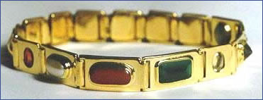 gemstone therapy bracelet or bangle, also known as a Navaratna or nine gem bangle. Although this one is set in gold, we also set many in silver.