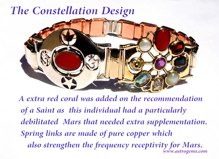 constellation design bangle with added red coral