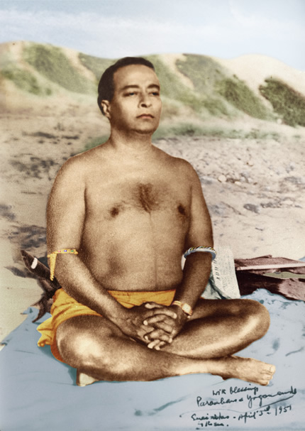 yogananda on beach meditating